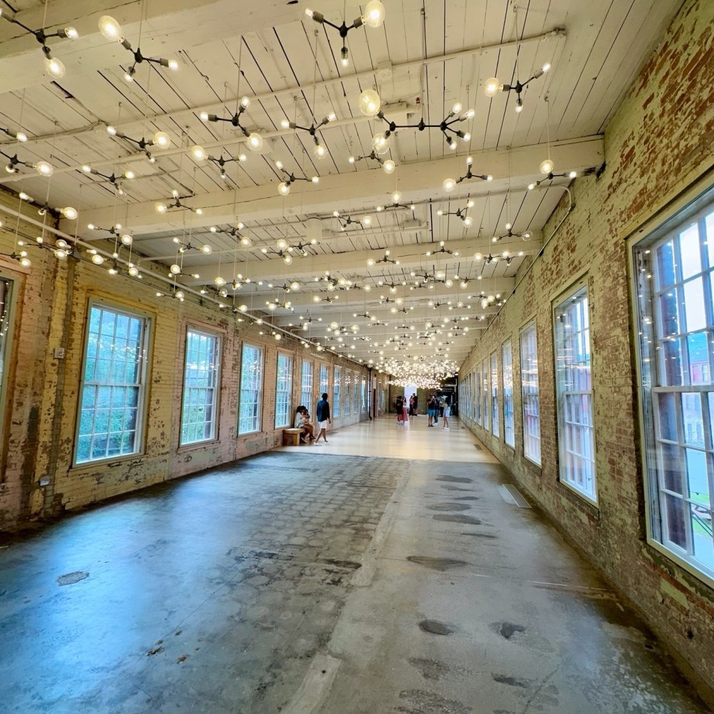hallway decorated with strings of white lights